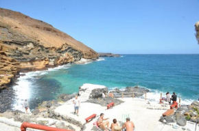 BIg property by the beach and natural pool